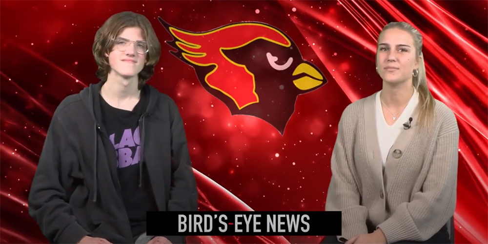 Two student reporters deliver a Bird's-Eye News segment