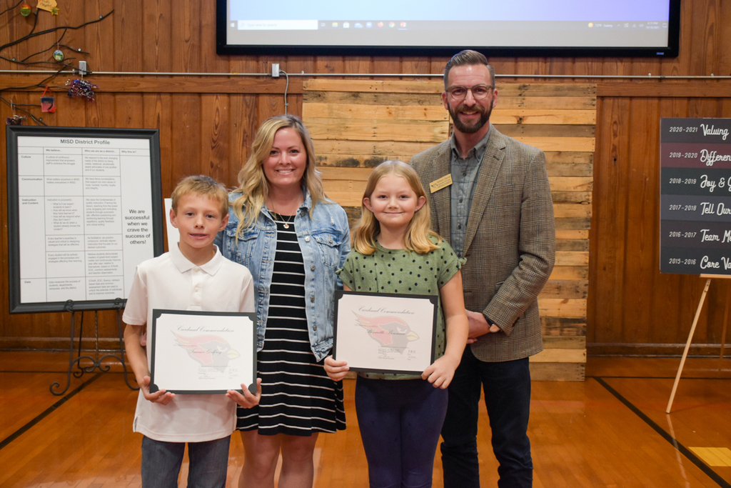 Students from Harry McKillop Elementary pose with their certificates